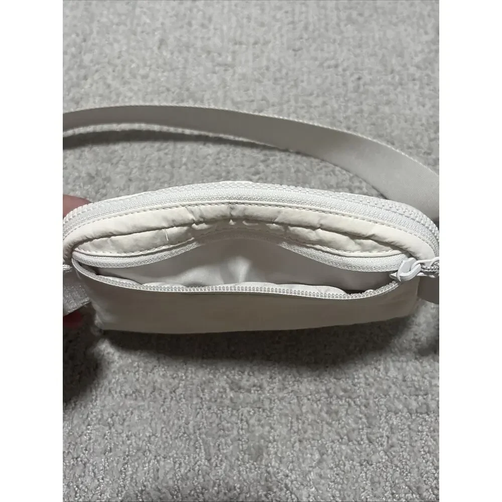 LLululemon Everywhere Belt Bag OS Adjustable Strap Ivory Metallic Logo NWOT